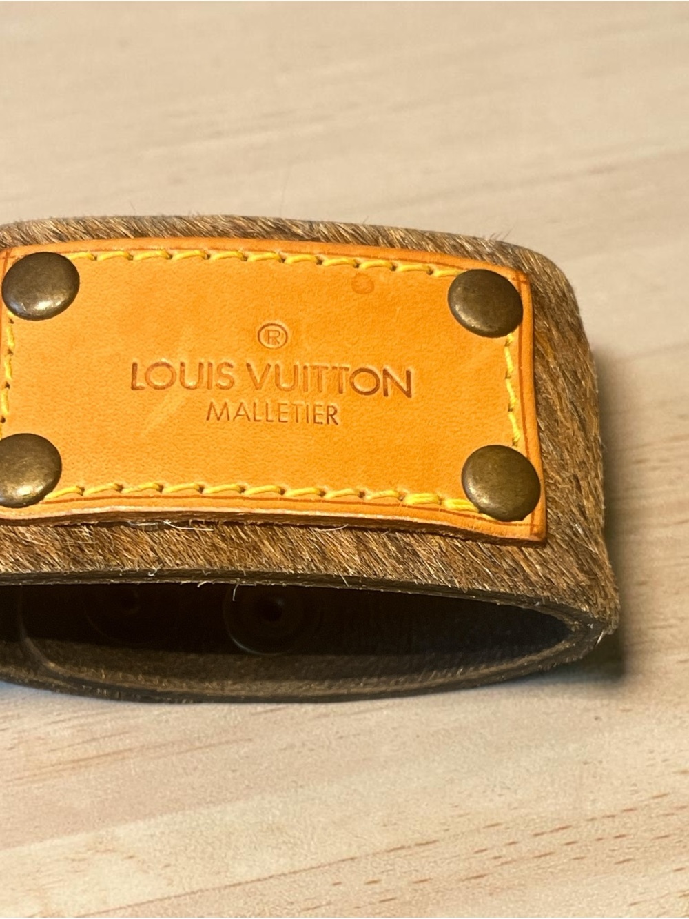 KEEP IT GYPSY Brown Haircalf Snap cuff w/ LV Patch